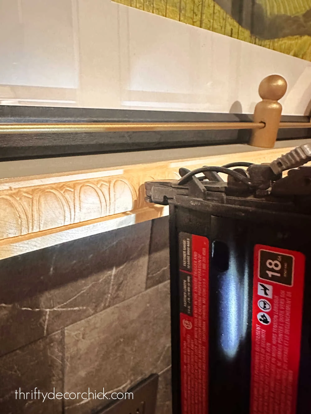 nailing decorative trim to front of shelf